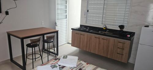 Nhà bếp/bếp nhỏ tại kitnet 3 paulista Douglas · Loft 3 Espaço Inteiro em Frente ao PQ Ecológico