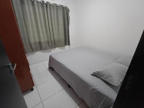 A bed or beds in a room at Casa Foz