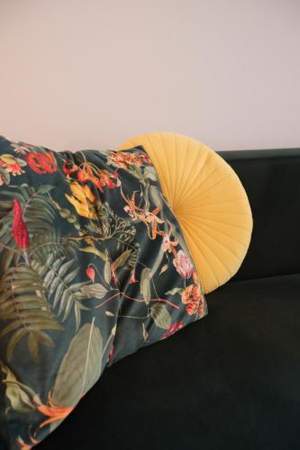 a pillow with at Boerderij de Windroos in Tollebeek