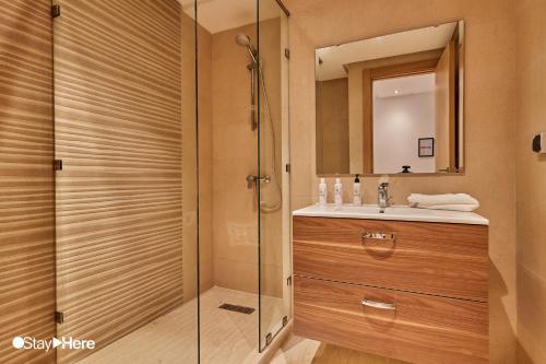 a bathroom with a shower and a sink at Stayhere Rabat - Hassan - Authentic Residence in Rabat