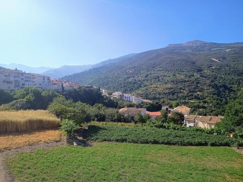 a view of a small village on a mountain at Sierra y Silencio Nómada, WIFI, Trastero y Garaje in Güéjar-Sierra