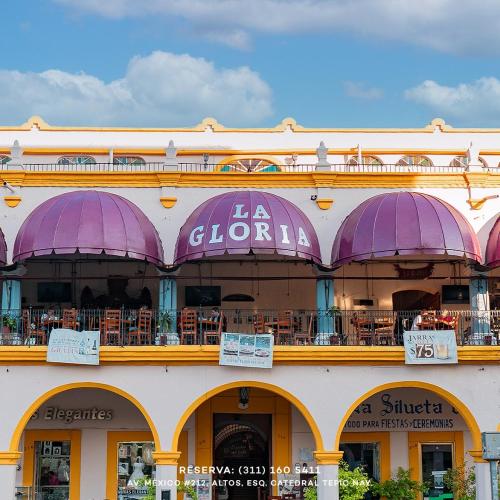 a building with purple domes on top of it at Casona Imperial in Tepic