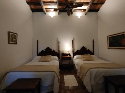 Postel nebo postele na pokoji v ubytování Finca El Recreo
