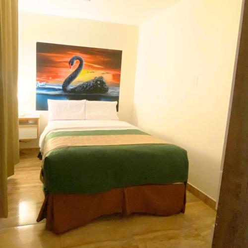 Ένα ή περισσότερα κρεβάτια σε δωμάτιο στο Hotel Soul Mate Inn