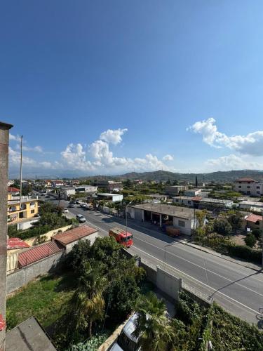 an aerial view of a city with a street at Alkeo's Apartments in Shkodër