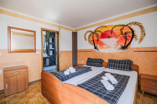 Ένα ή περισσότερα κρεβάτια σε δωμάτιο στο Guesthouse Siva Čaplja