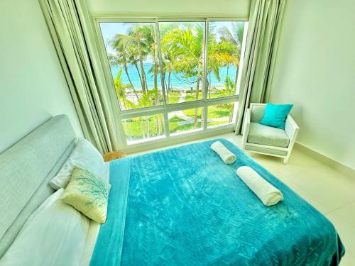 Ένα ή περισσότερα κρεβάτια σε δωμάτιο στο Sea Winds Cabarete