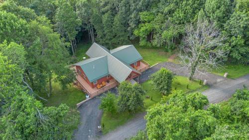 an overhead view of a house in the woods at Mountain Views - Firepit - Gas Fireplace - Sleeps 15 in Grassy Creek