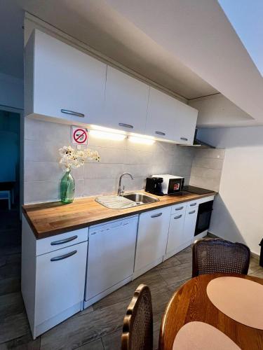 Dapur atau dapur kecil di Superbe 57 appartement 2