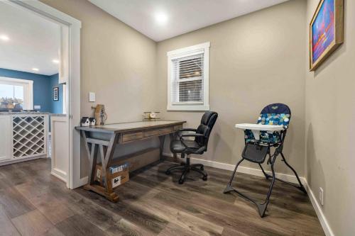 a home office with a desk and two chairs at Hartley Lake Hideaway - The Perfect Getaway! in Brainerd