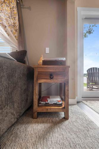 a wooden end table with a table sidx sidx sidx sidx sidx sidx sidx at Hartley Lake Hideaway - The Perfect Getaway! in Brainerd