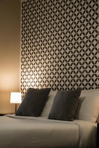 Hemma Bogotá Chapinero Premium Suites Hotelにあるベッド