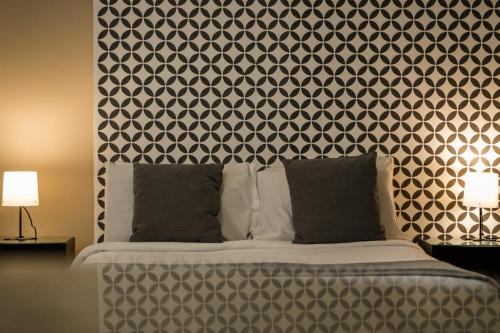 Hemma Bogotá Chapinero Premium Suites Hotelにあるベッド