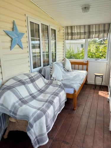 a bedroom with a bed and a star on the wall at The Lodge in Newport