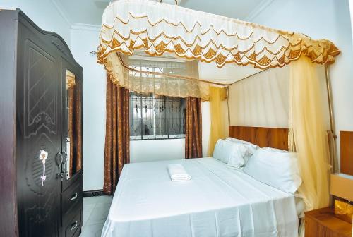 Postel nebo postele na pokoji v ubytování Irenka Residence