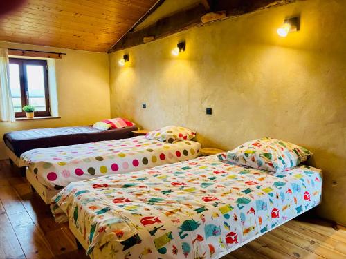 Gîte du NL Ranchにあるベッド