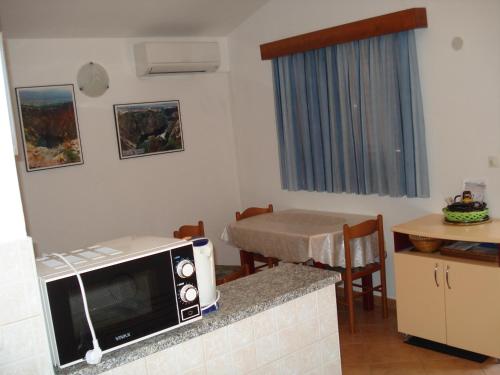 Kuchyň nebo kuchyňský kout v ubytování Villa Ojdana