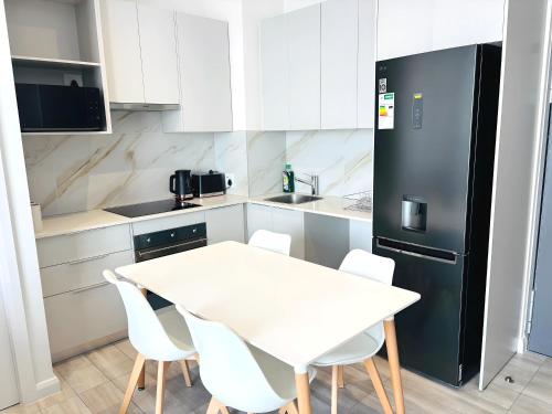 Η κουζίνα ή μικρή κουζίνα στο Menlyn Maine Residences - Capital Trilogy