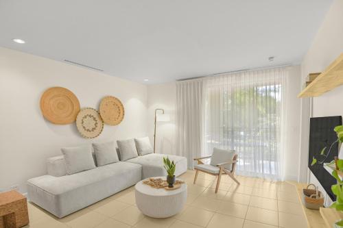 Posezení v ubytování Serenidad del Pacifico Condo, Resort Pools & Near Coco Beach