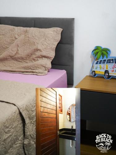 a bedroom with a bed with a pillow and a tv at Back to the Beach Hostel - Pipa in Pipa