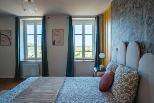 Postel nebo postele na pokoji v ubytování Le Pré de la Mer Le Gîte