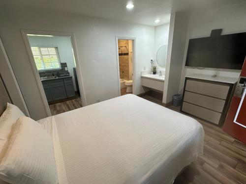 Letto o letti in una camera di Town and Country Inn