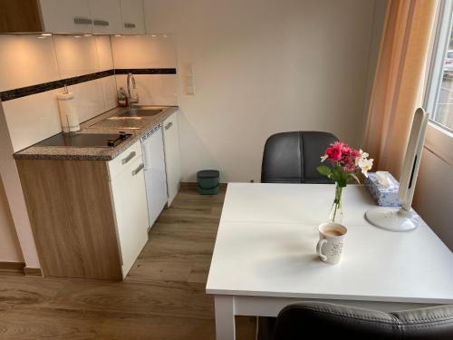 Кухня или мини-кухня в Gemütliches und komfortables Studio in Frankfurt
