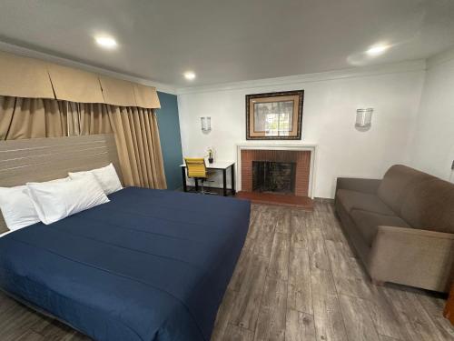 Letto o letti in una camera di Town and Country Inn