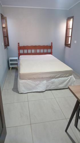 Postel nebo postele na pokoji v ubytování Kitnet mobiliada