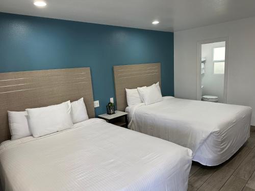 Letto o letti in una camera di Town and Country Inn