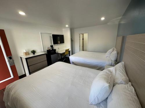 Letto o letti in una camera di Town and Country Inn