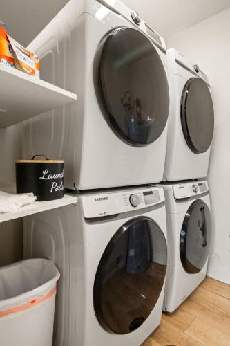 two washing machines sitting next to each other at Near Downtown Stylish 2BR With Amazing Patio - 4 in Moab