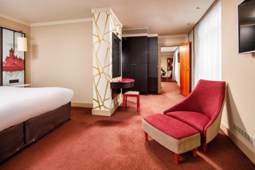 Ένα ή περισσότερα κρεβάτια σε δωμάτιο στο Central Cardiff Signature Collection by Dancenter