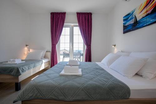 Apartments by the sea Banjol, Rab - 21635