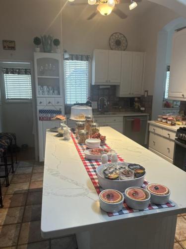 a kitchen counter with several bowls of food on it at The Blenman Inn in Tucson
