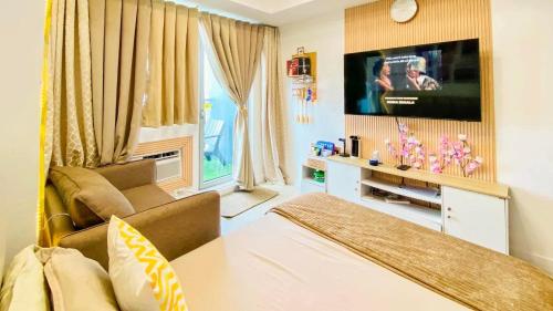 Ένα ή περισσότερα κρεβάτια σε δωμάτιο στο NG staycation Azure north pampanga