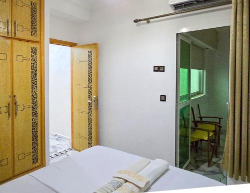 Postel nebo postele na pokoji v ubytování Appart Hotel Fes Heritage Luxe - 2-Chambres, Garage & Proximité Medina