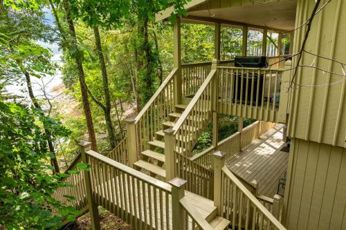 a staircase leading up to a house with trees at Ma Cook Lodge - Sharps Chapel in Maynardville