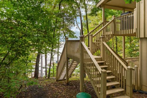 a wooden staircase leading up to a house at Ma Cook Lodge - Sharps Chapel in Maynardville