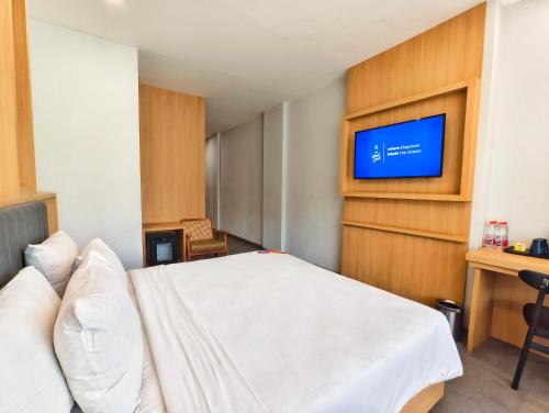 The West Cove Hotelにあるベッド