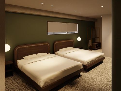 Ένα ή περισσότερα κρεβάτια σε δωμάτιο στο TRANSCENDER HOTEL Yokohama