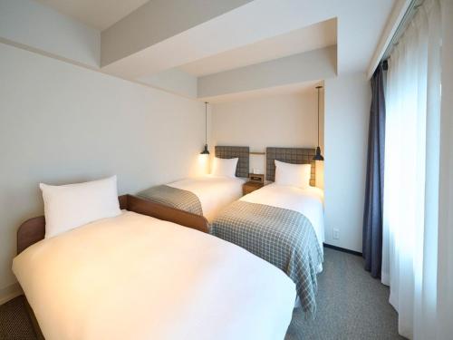 Cama o camas de una habitación en Hotel Resol Stay Akihabara