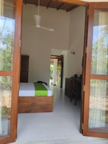 Cama o camas de una habitación en Sekkugala Villa