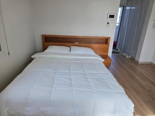 Postel nebo postele na pokoji v ubytování 이음채