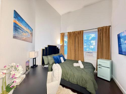a bedroom with a bed and a chair in it at BP STAYS - Hotel-Style, No Host, Professionally Managed ID302 in Jersey City