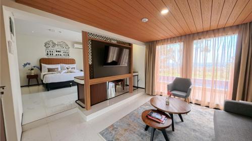 TV a/nebo společenská místnost v ubytování Patra Semarang Hotel & Convention