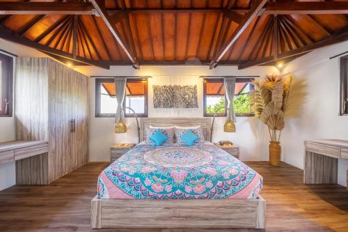 Giường trong phòng chung tại Villa Lebah Seminyak