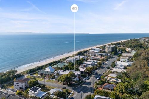 an aerial view of a beach with condos at Casa al mare - Bribie Island 5BD Retreat in Woorim