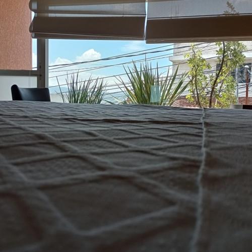 a close up of a table with a view at Casa Cielo Lindavista in Tulancingo