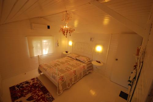 Letto o letti in una camera di Lukkies Lodge Cirali